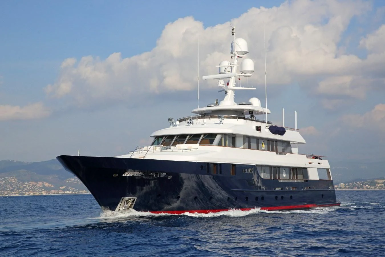 a large ship in the water aboard HELIOS 2 Yacht for Sale