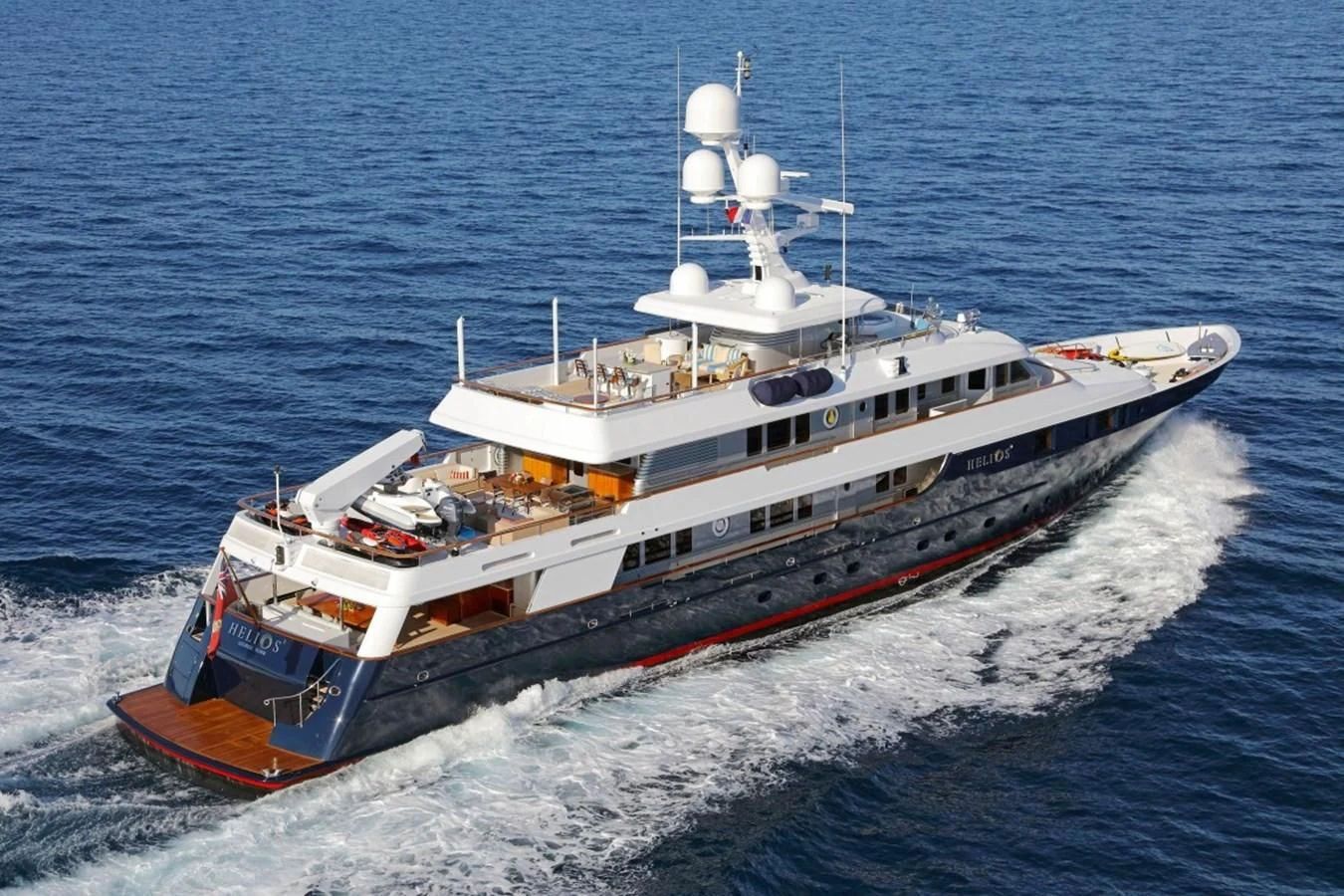 a large ship in the water aboard HELIOS 2 Yacht for Sale