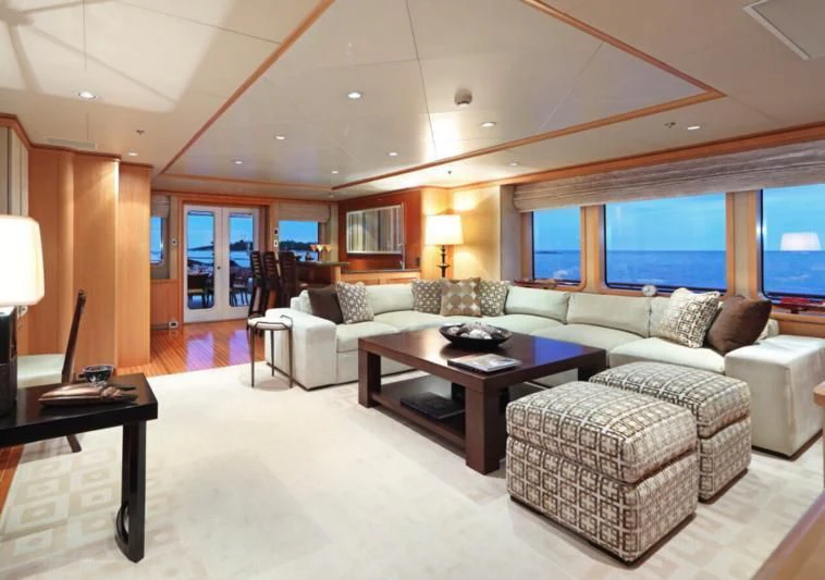 a living room with a large window aboard HELIOS 2 Yacht for Sale