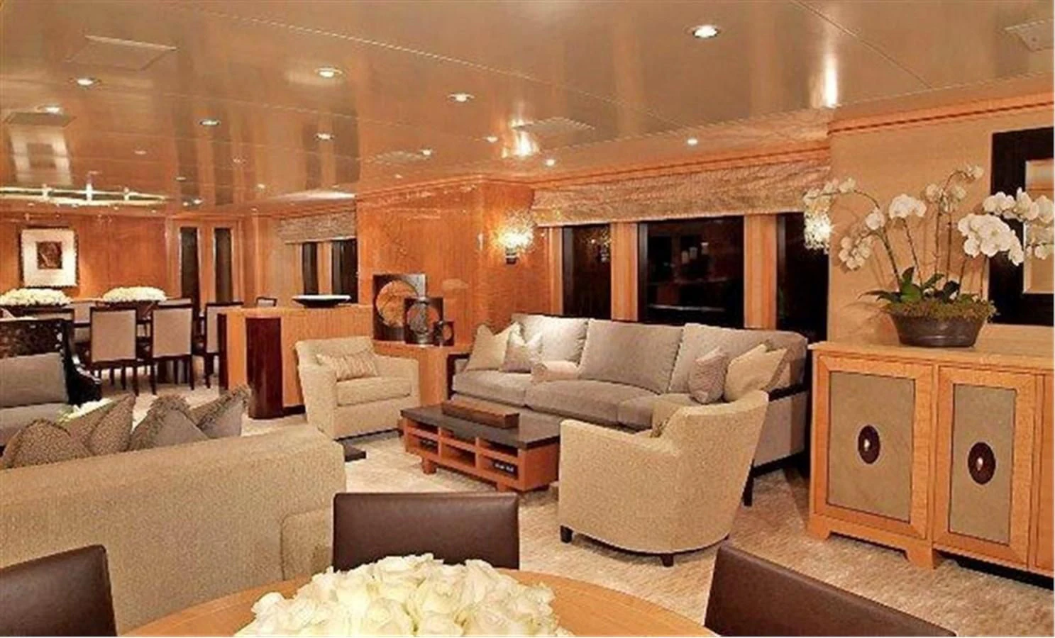 a living room with a fireplace aboard HELIOS 2 Yacht for Sale