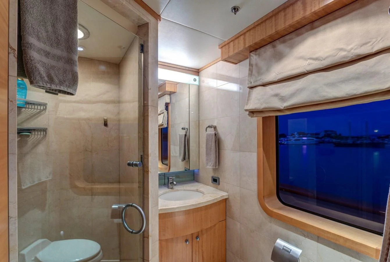 a bathroom with a shower and sink aboard HELIOS 2 Yacht for Sale