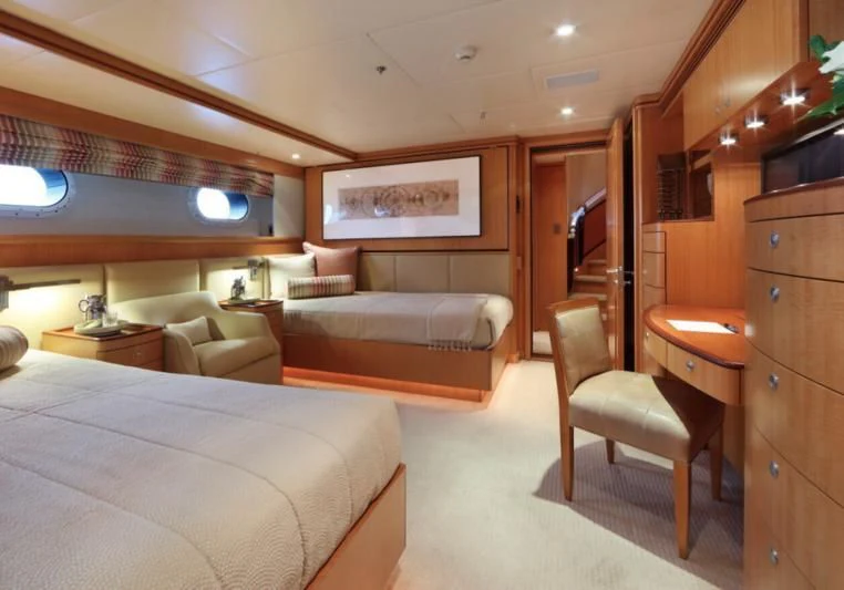 a room with a bed and a couch aboard HELIOS 2 Yacht for Sale