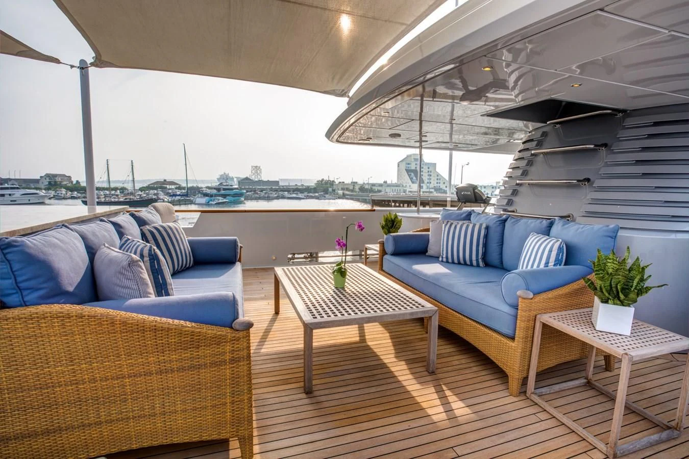 a room with a table and couches aboard HELIOS 2 Yacht for Sale