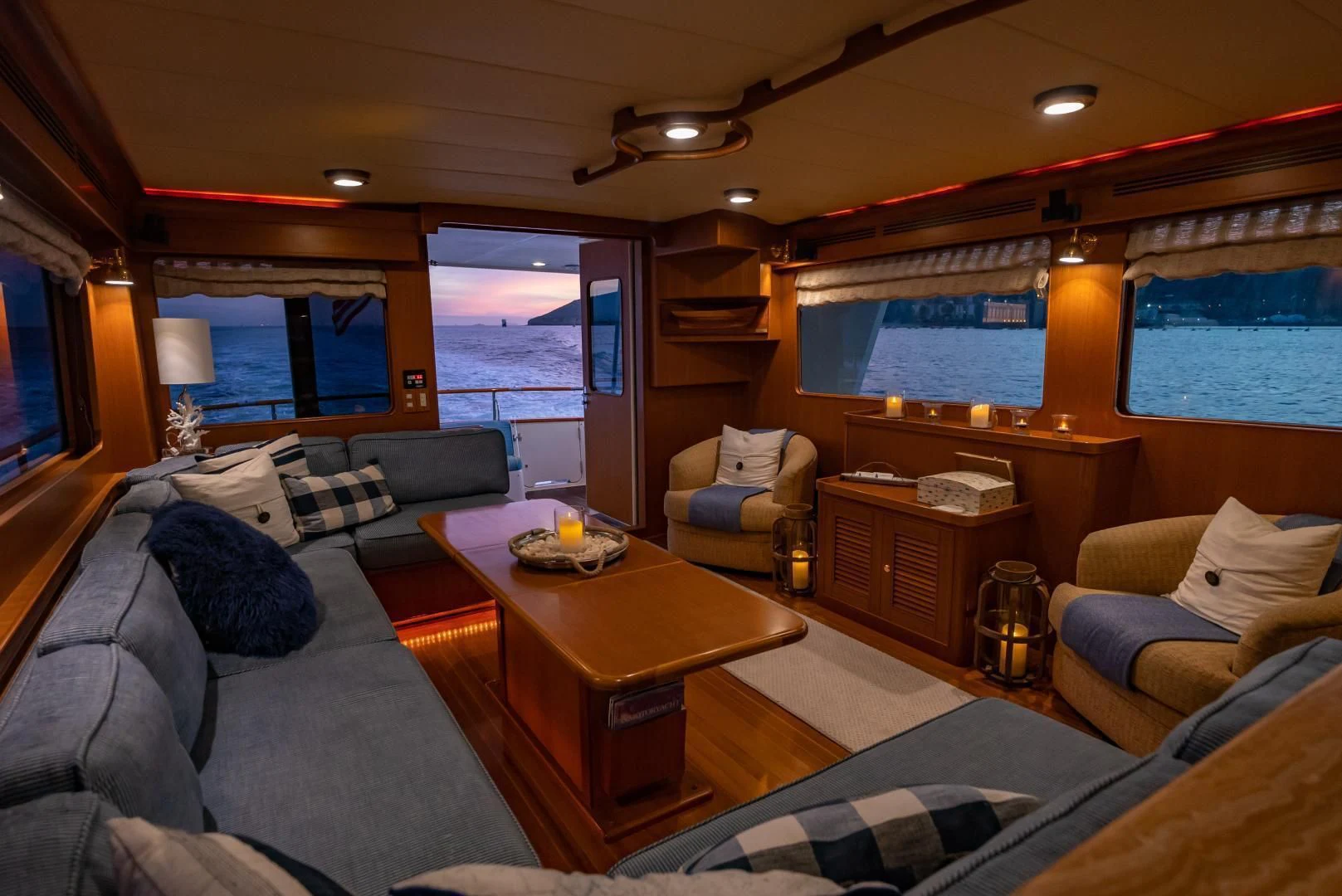 a living room with a couch and a coffee table aboard HALCYON SEAS Yacht for Sale