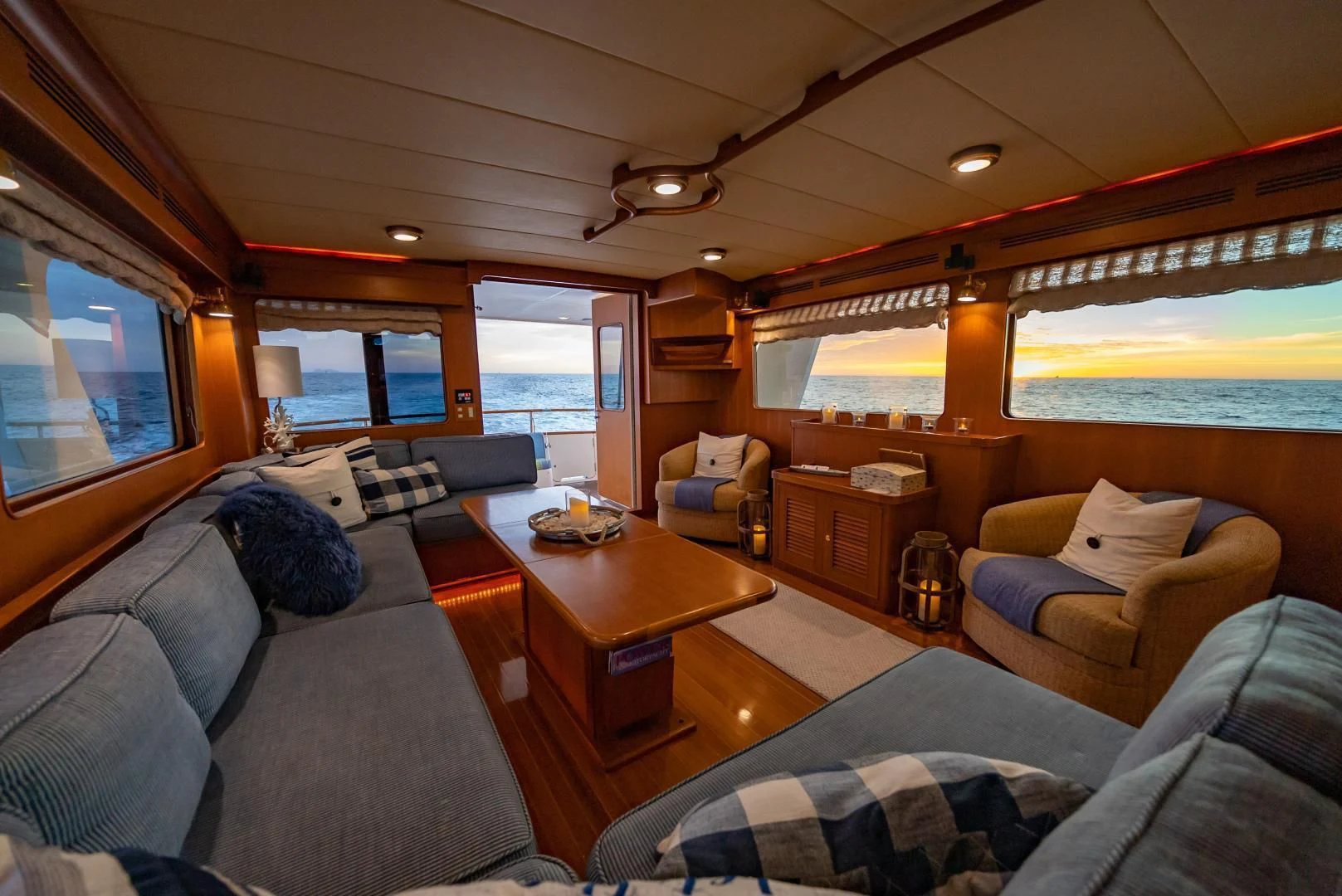 a living room with a large window aboard HALCYON SEAS Yacht for Sale