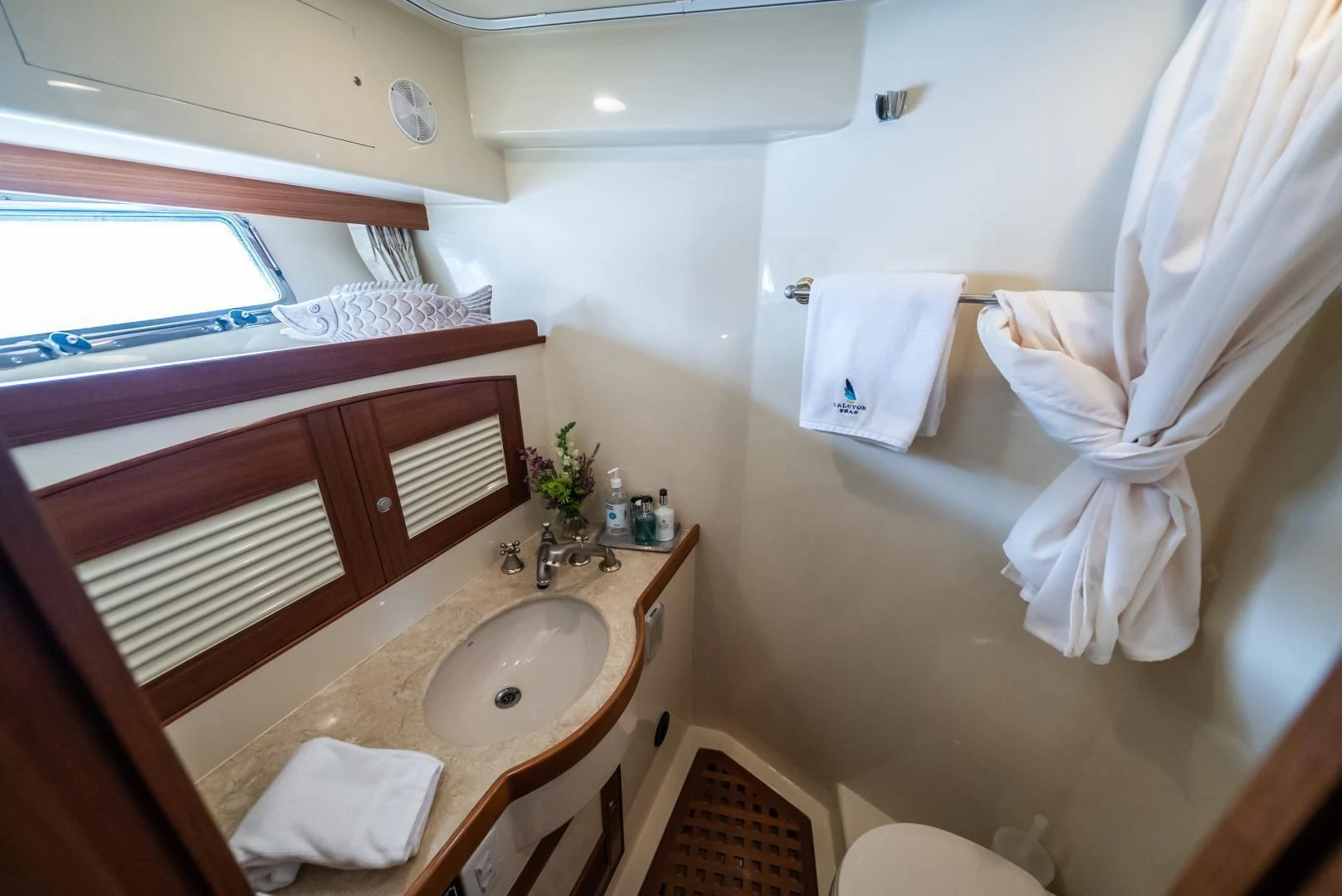 a bathroom with a sink and a bathtub aboard HALCYON SEAS Yacht for Sale