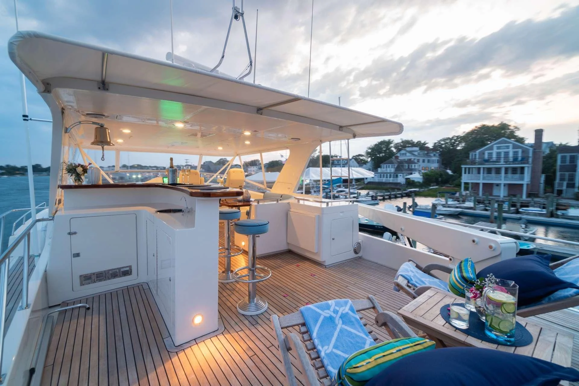 a deck with a view of a city and a large body of water aboard HALCYON SEAS Yacht for Sale