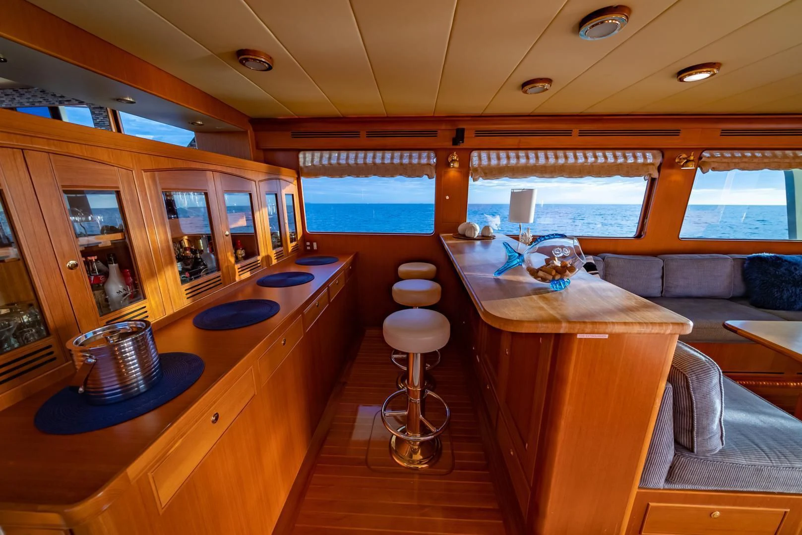 a room with a table and chairs aboard HALCYON SEAS Yacht for Sale