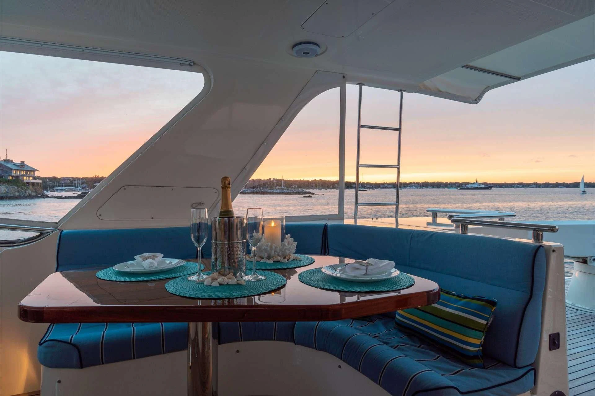 a table with a candle on it aboard HALCYON SEAS Yacht for Sale