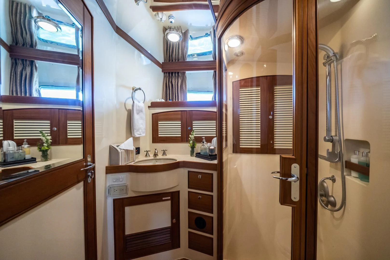 a bathroom with a sink and a mirror aboard HALCYON SEAS Yacht for Sale