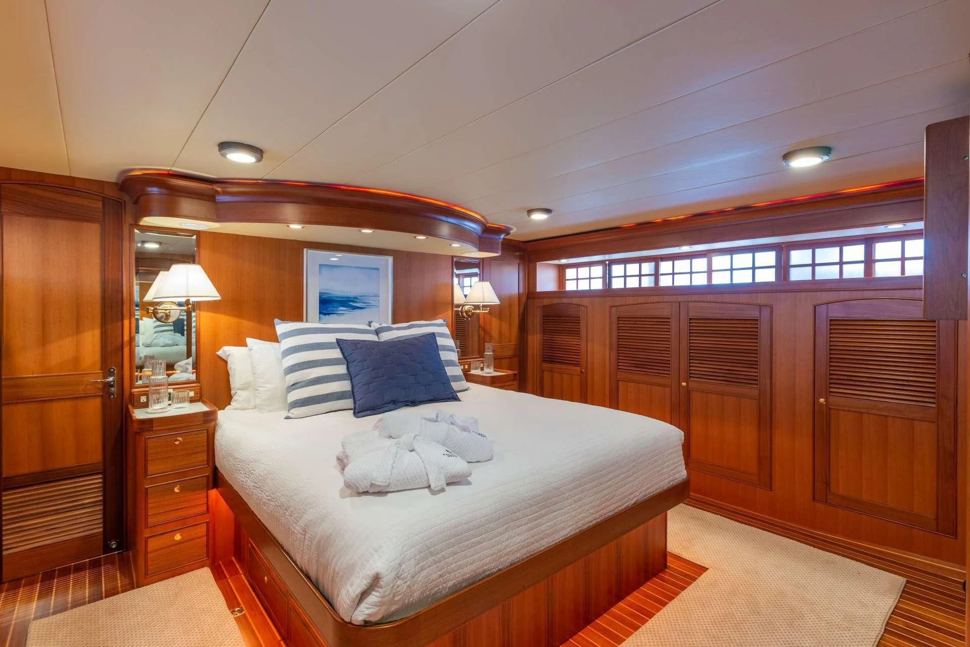 a large bedroom with a large bed aboard HALCYON SEAS Yacht for Sale