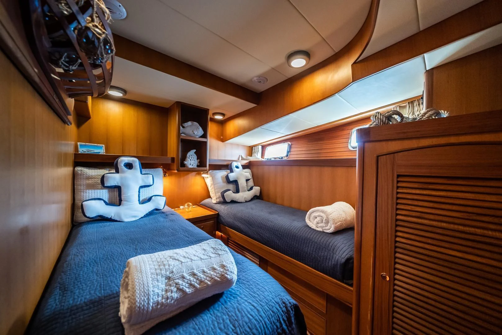 a couple of white cats on a bed in a room aboard HALCYON SEAS Yacht for Sale