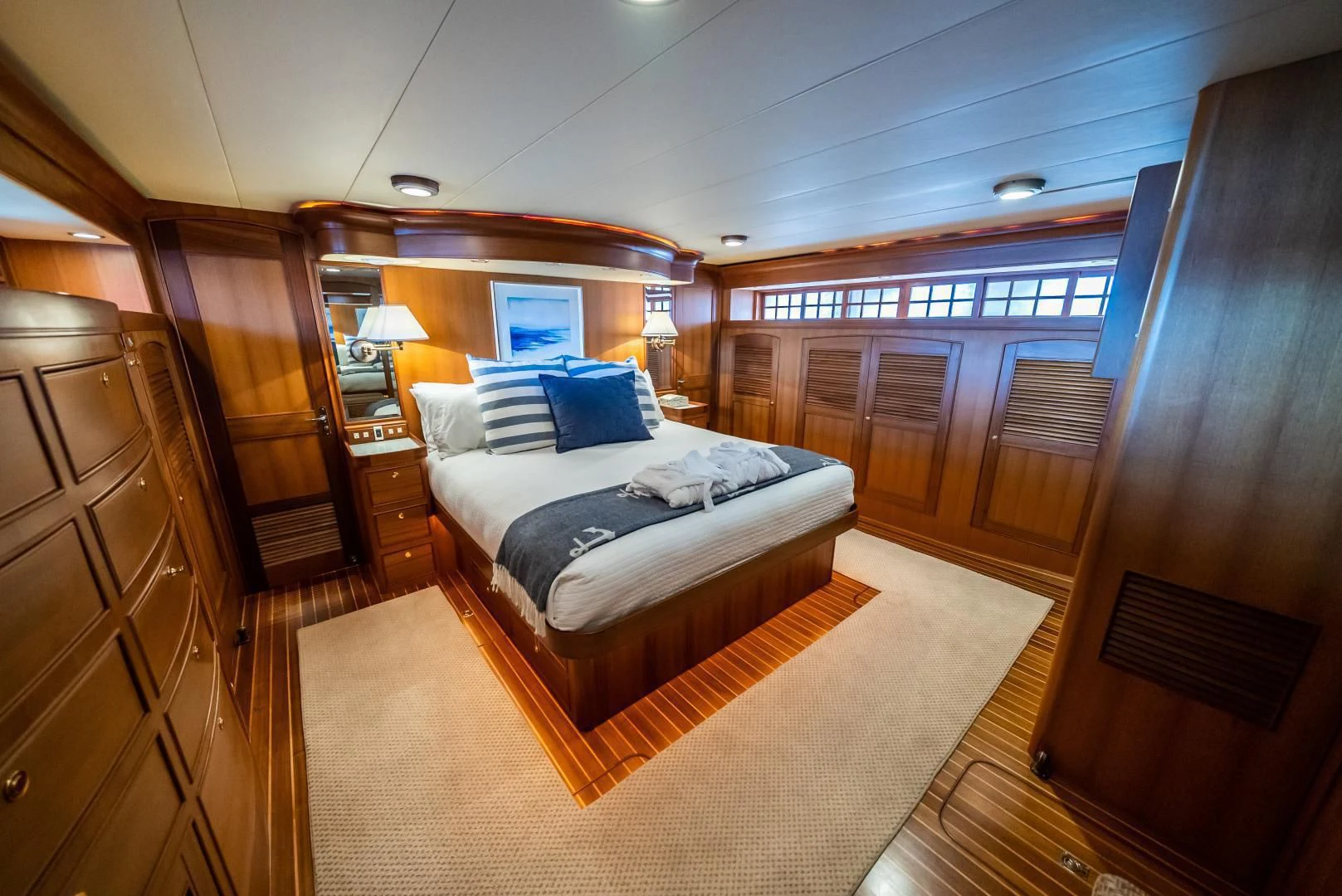 a bedroom with a large bed aboard HALCYON SEAS Yacht for Sale
