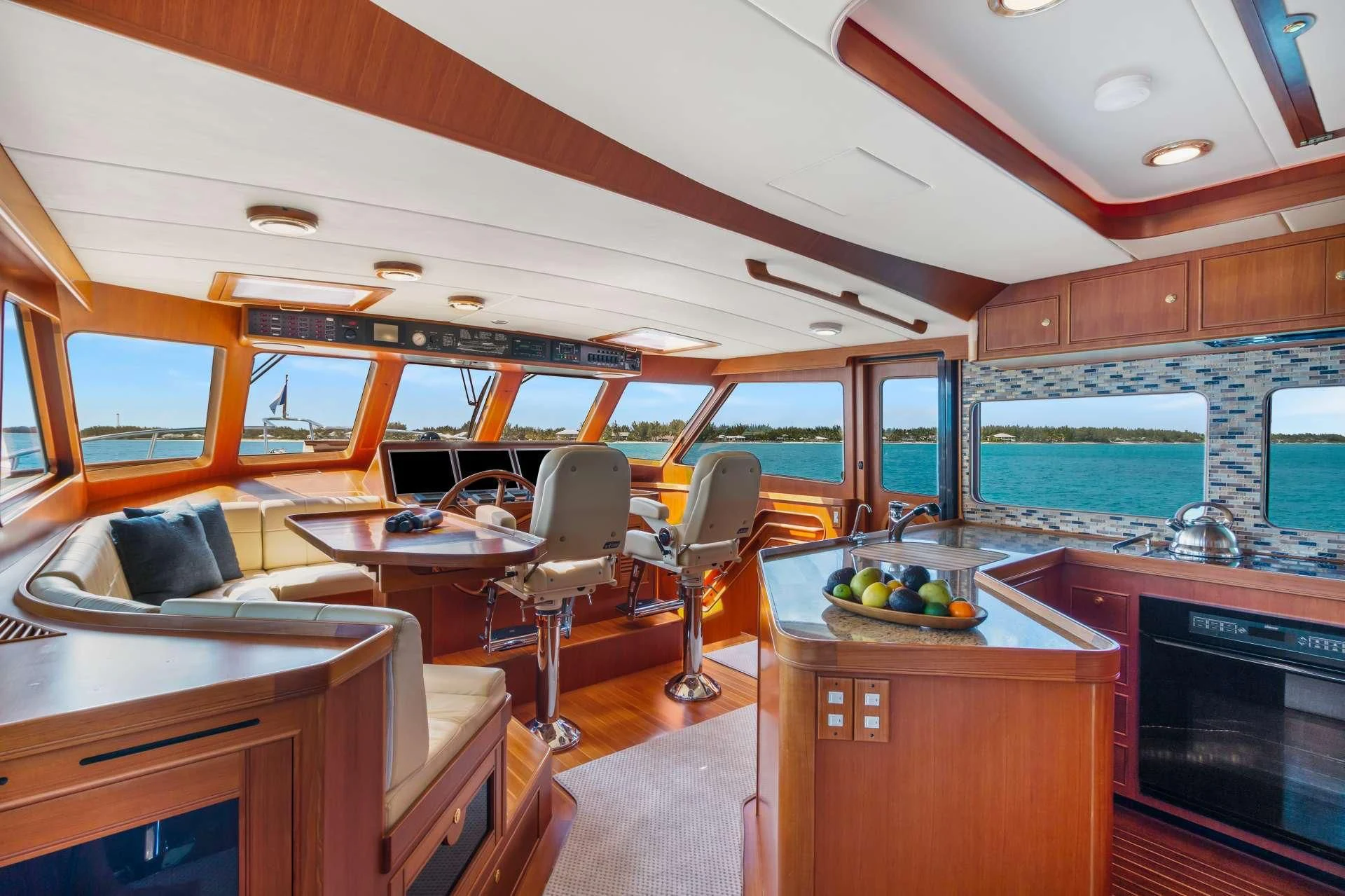 a kitchen with a large window aboard HALCYON SEAS Yacht for Sale
