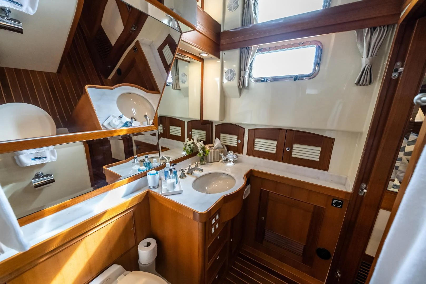 a bathroom with a sink and cabinets aboard HALCYON SEAS Yacht for Sale