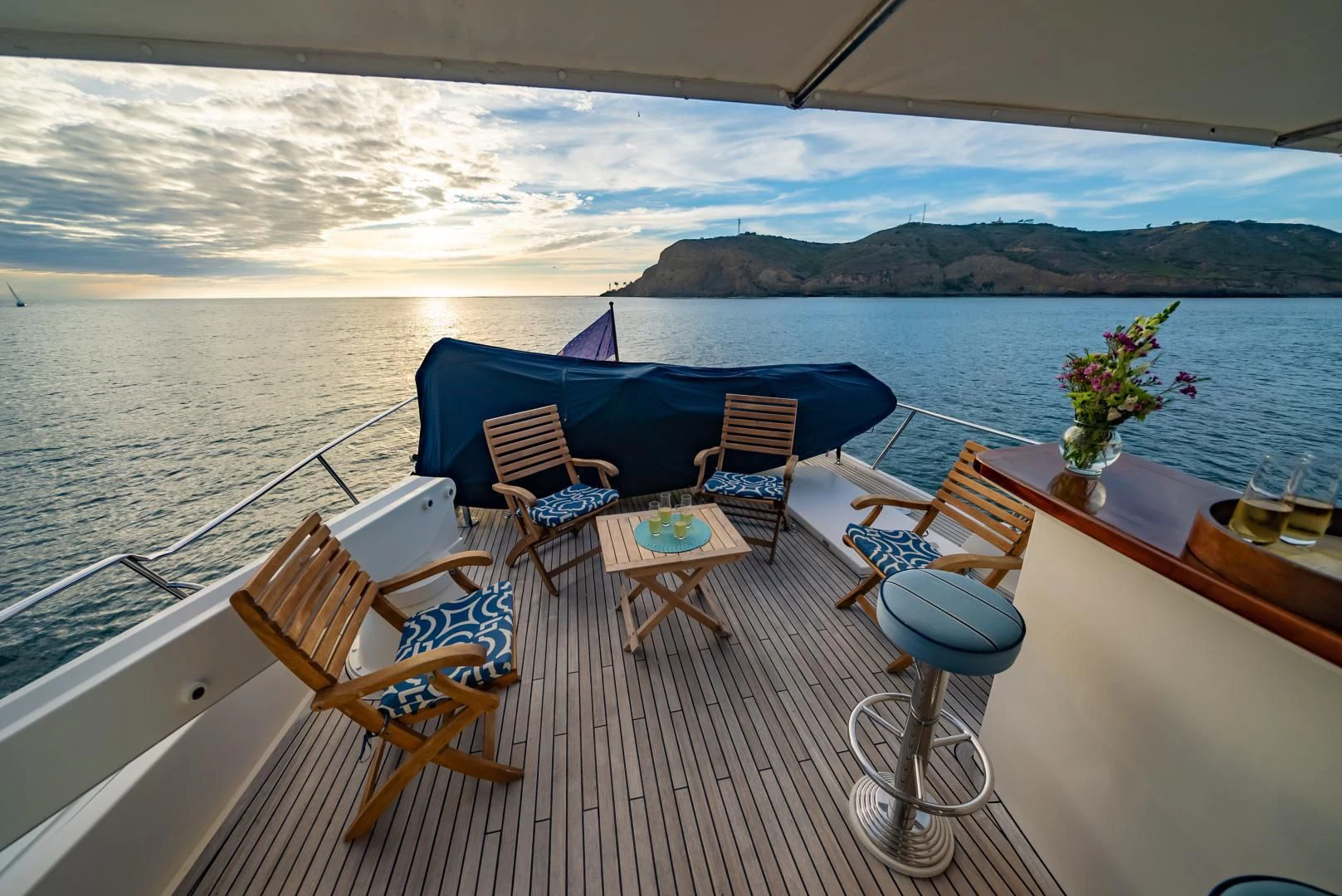 a room with tables and chairs aboard HALCYON SEAS Yacht for Sale