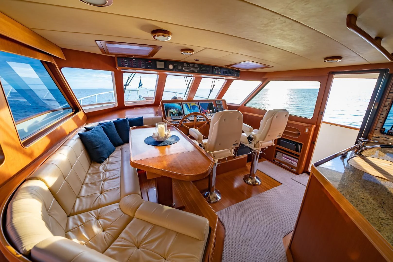 a train with a table and chairs aboard HALCYON SEAS Yacht for Sale