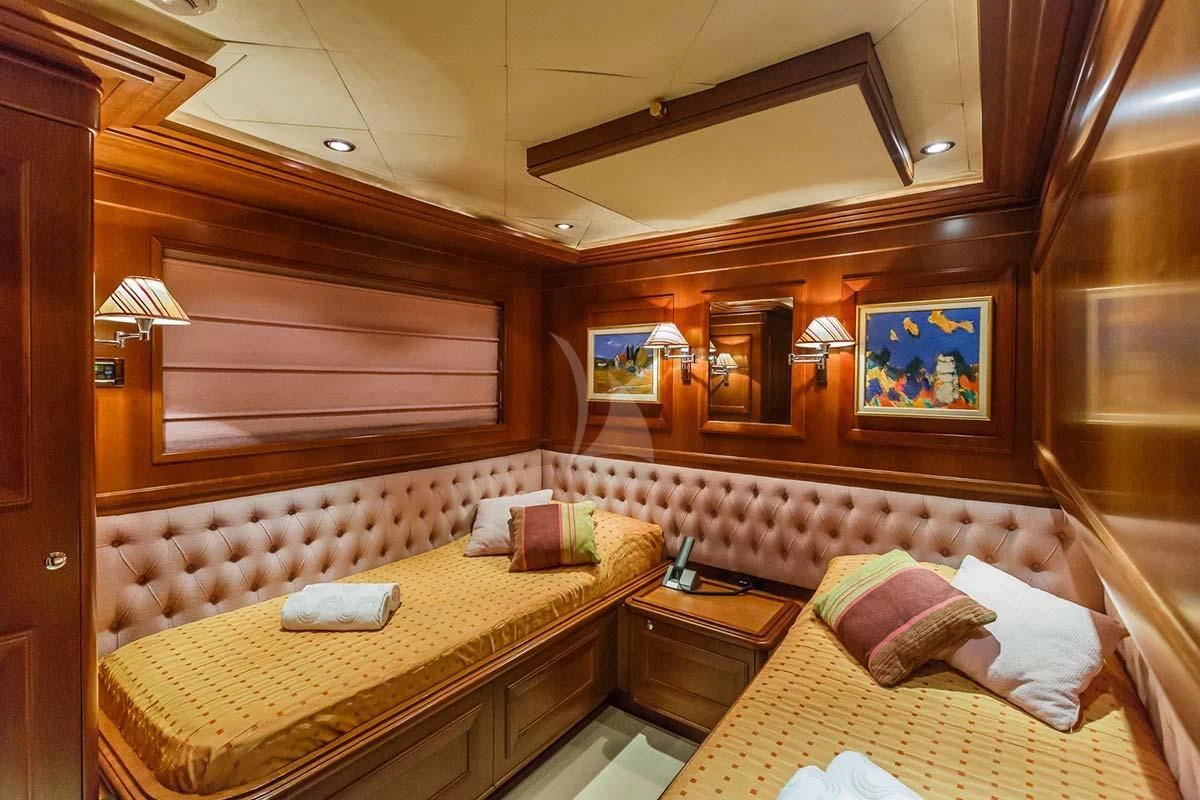 a room with two beds aboard KLOBUK Yacht for Charter