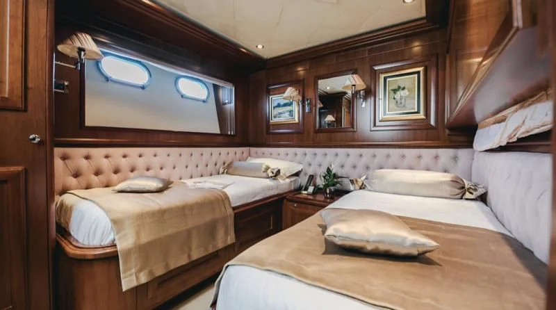 a room with two beds aboard KLOBUK Yacht for Charter
