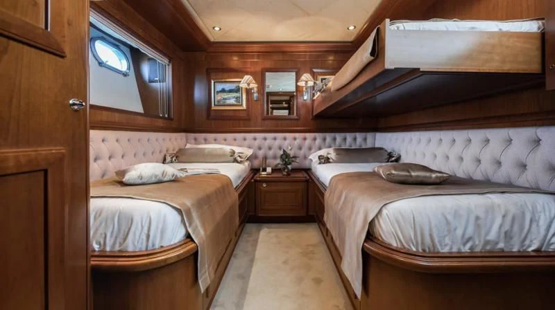a room with three beds aboard KLOBUK Yacht for Charter