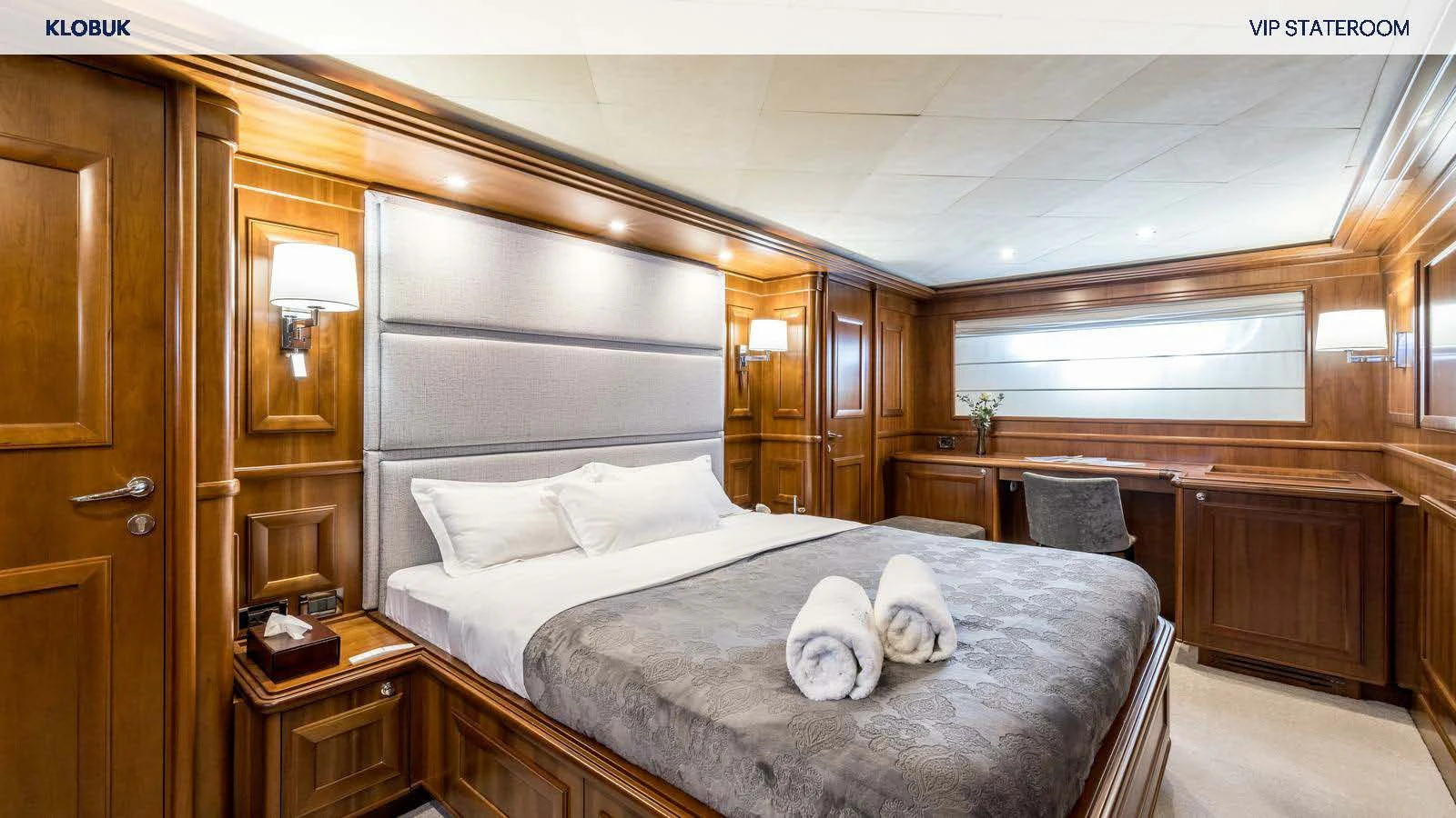 a bed in a room aboard KLOBUK Yacht for Charter