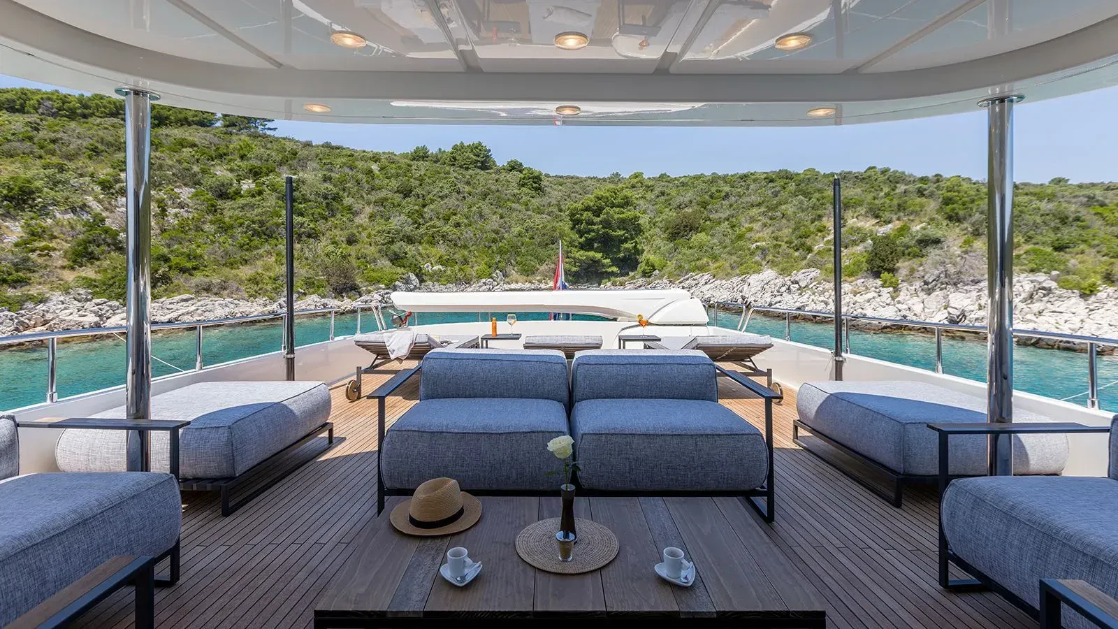a room with a table and chairs aboard KLOBUK Yacht for Charter
