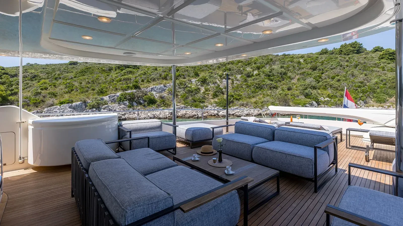 a large room with a large patio and a pool aboard KLOBUK Yacht for Charter