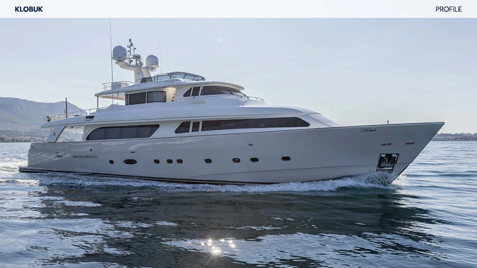 a white yacht in the water aboard KLOBUK Yacht for Charter