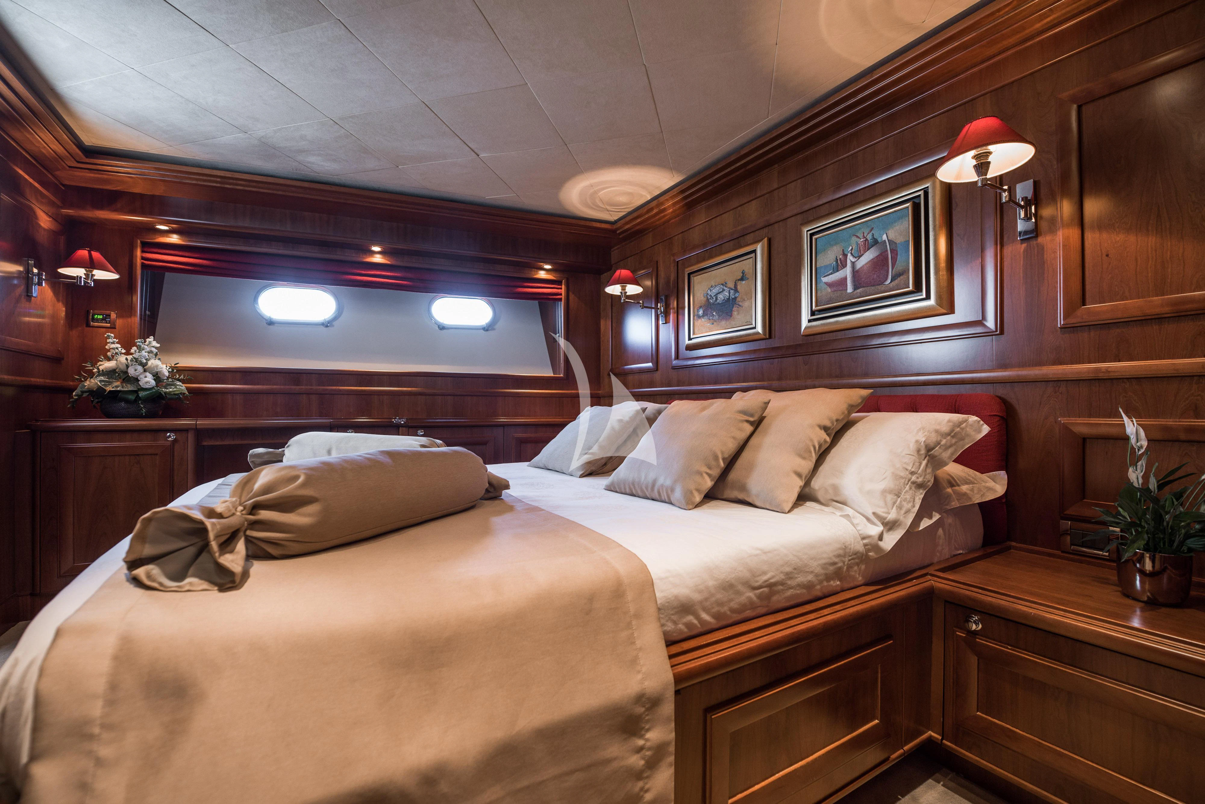 a room with two beds aboard KLOBUK Yacht for Charter
