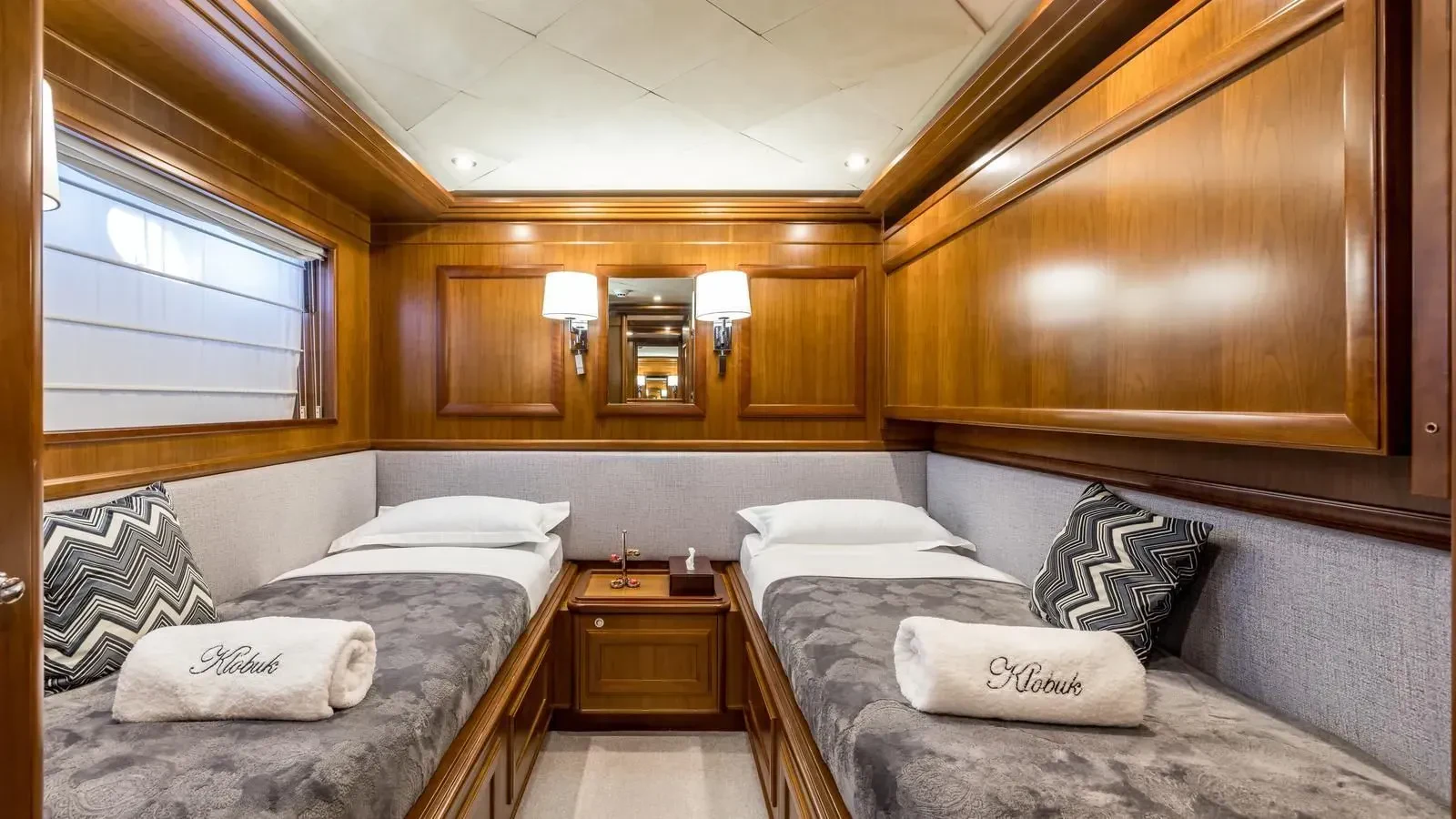 a room with two beds aboard KLOBUK Yacht for Charter