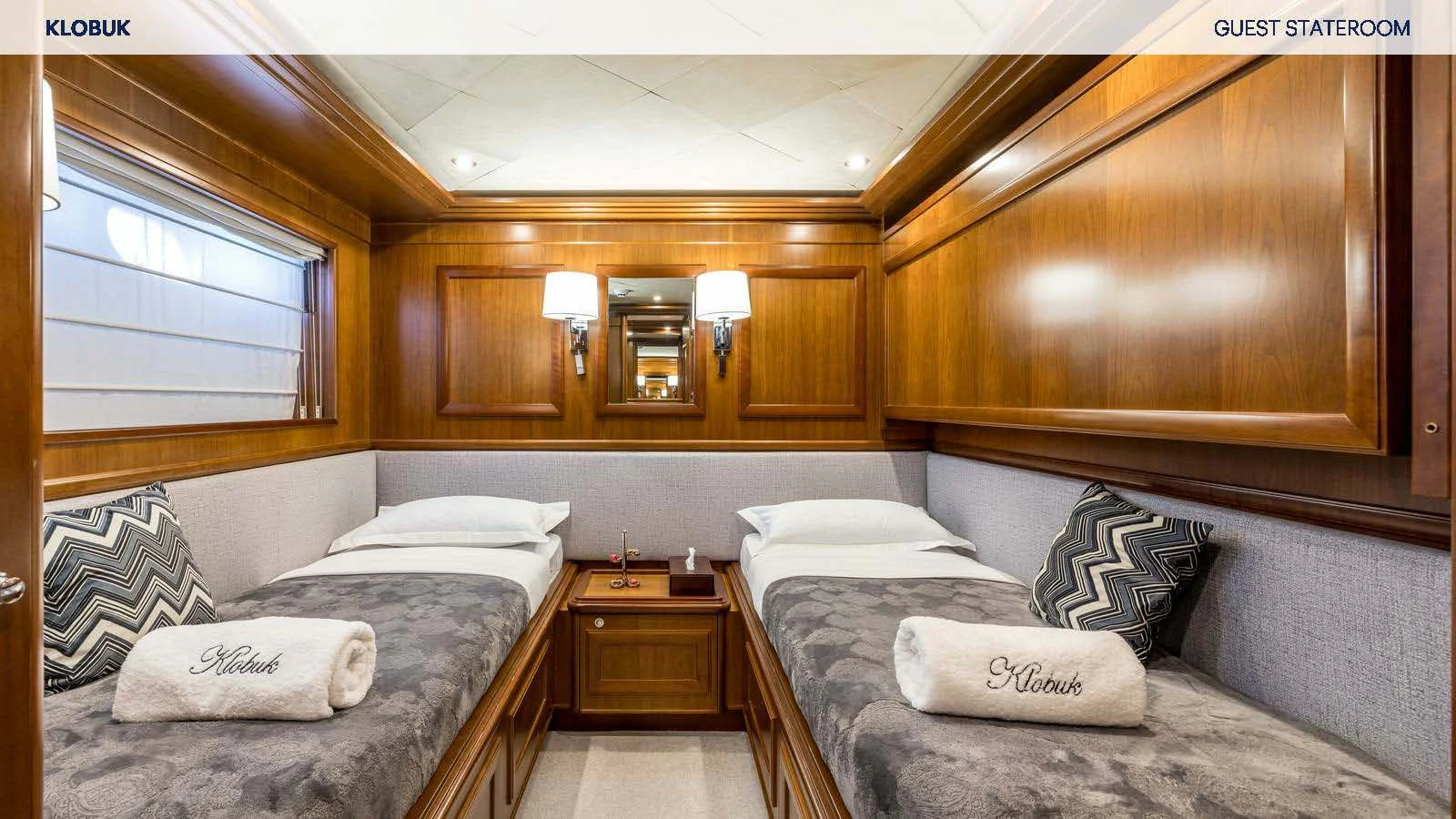 a room with two beds aboard KLOBUK Yacht for Charter