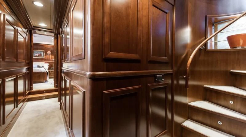 a room with wooden cabinets aboard KLOBUK Yacht for Charter