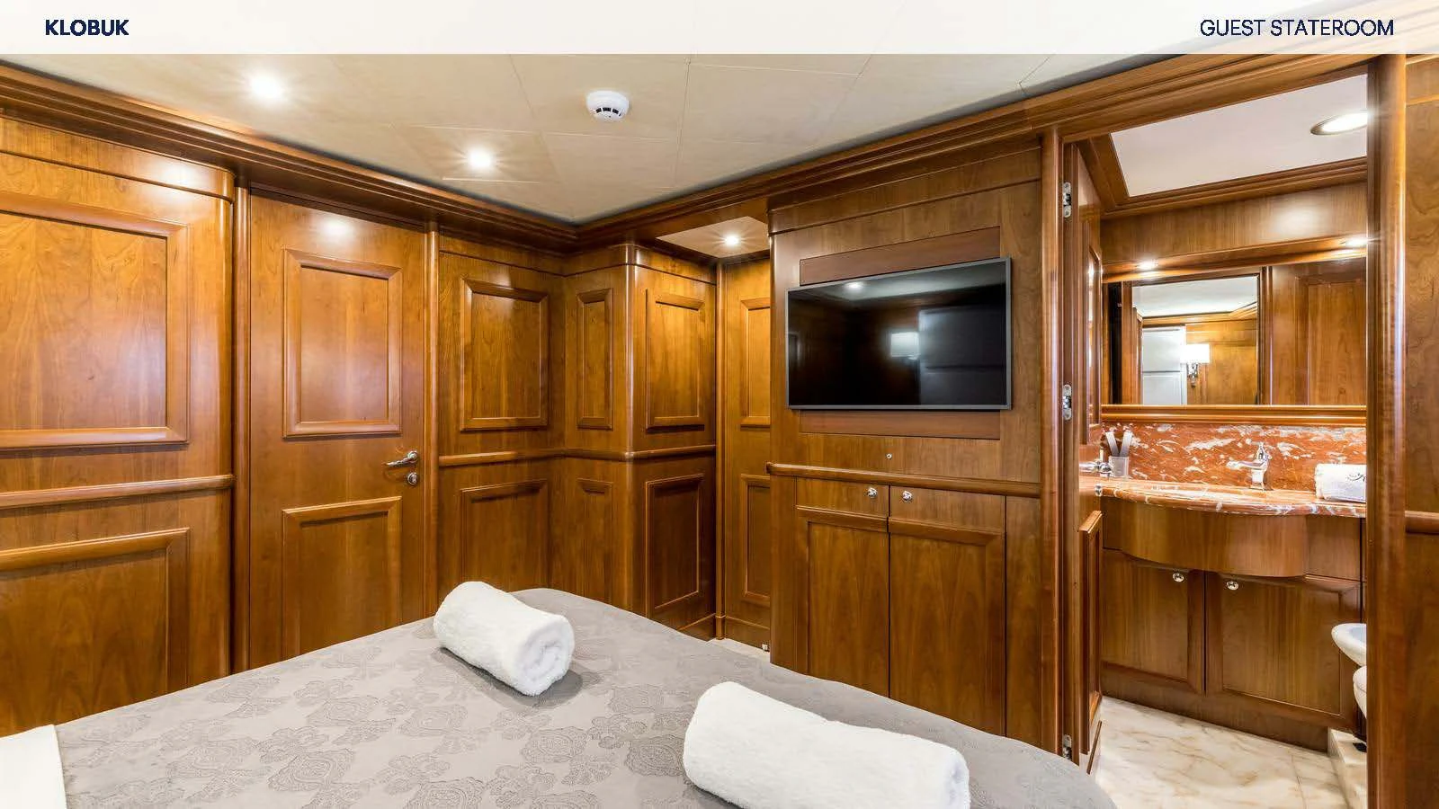 a bed in a room aboard KLOBUK Yacht for Charter