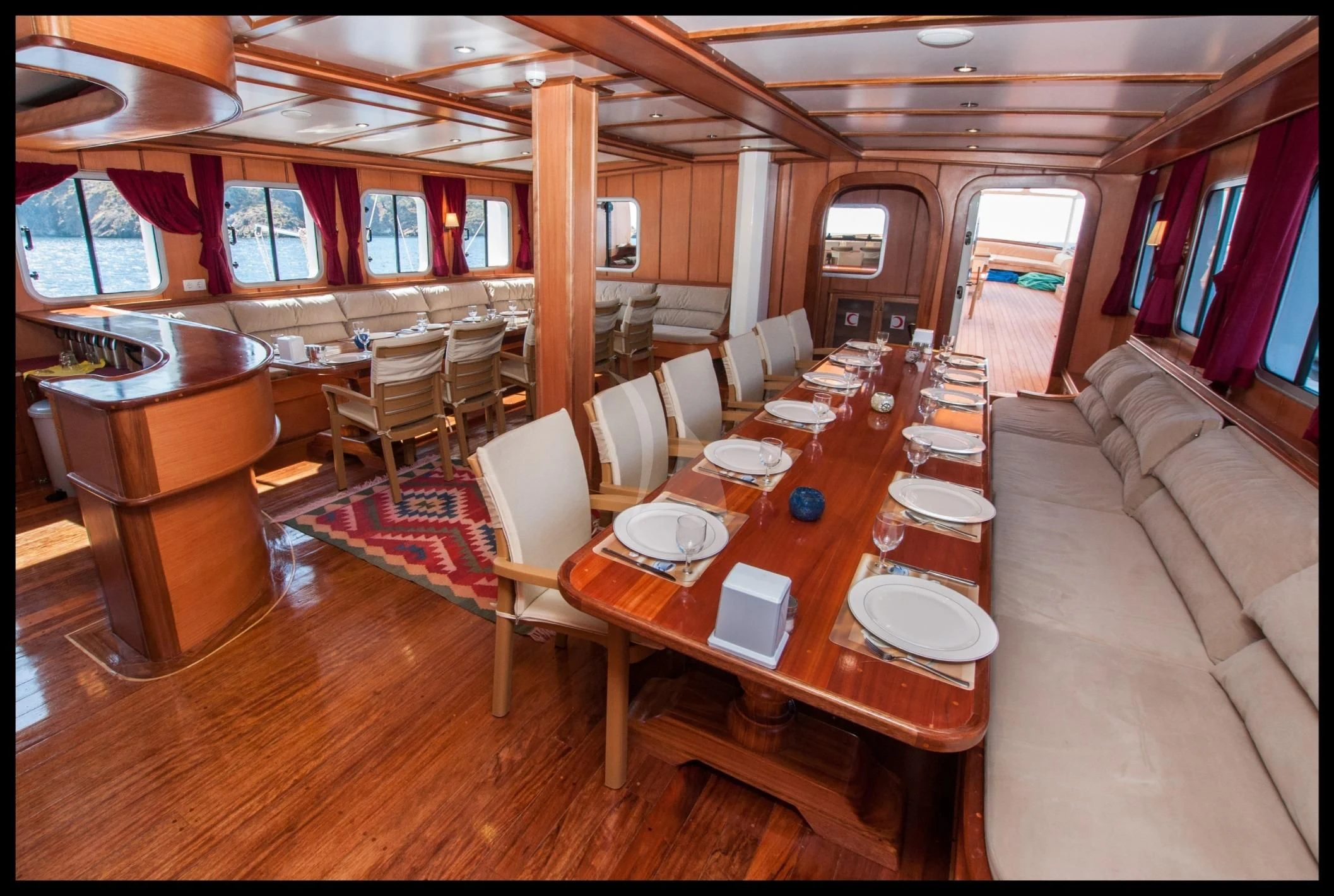 a room with tables and chairs aboard TERSANE 8 Yacht for Sale