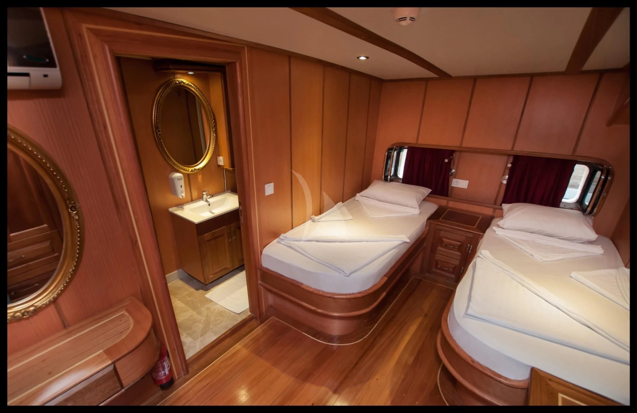 a room with a couple of beds aboard TERSANE 8 Yacht for Sale