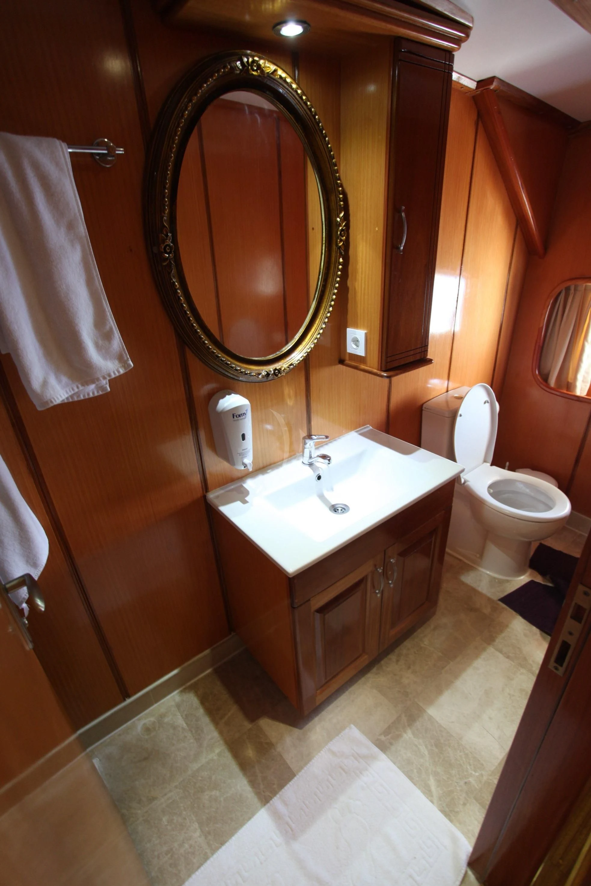 a bathroom with a large mirror aboard TERSANE 8 Yacht for Sale