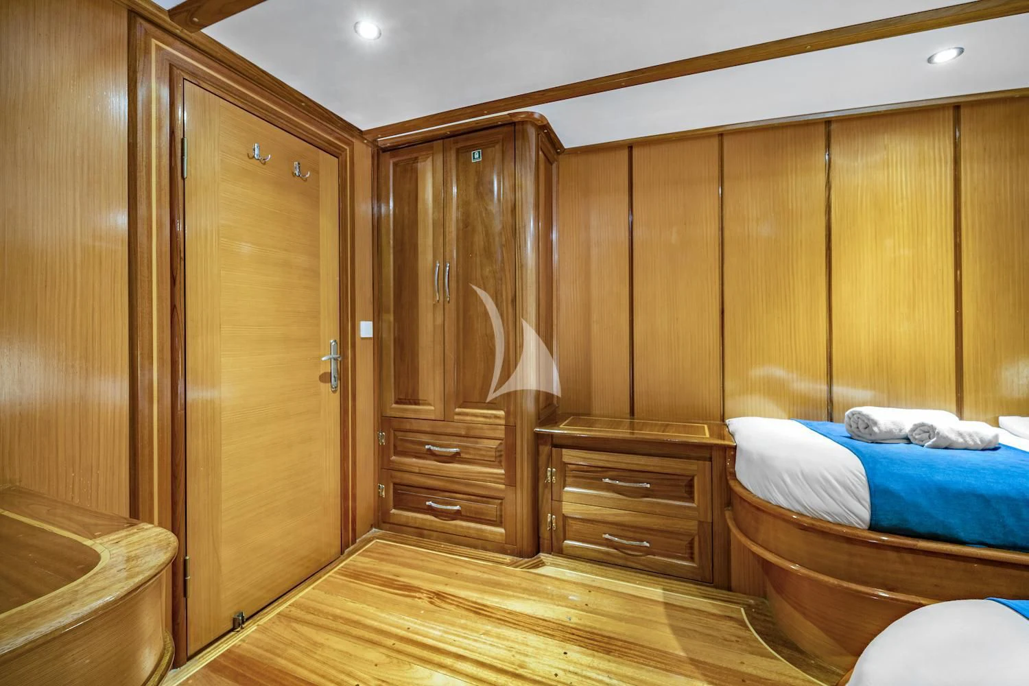 a room with wooden cabinets aboard TERSANE 8 Yacht for Sale