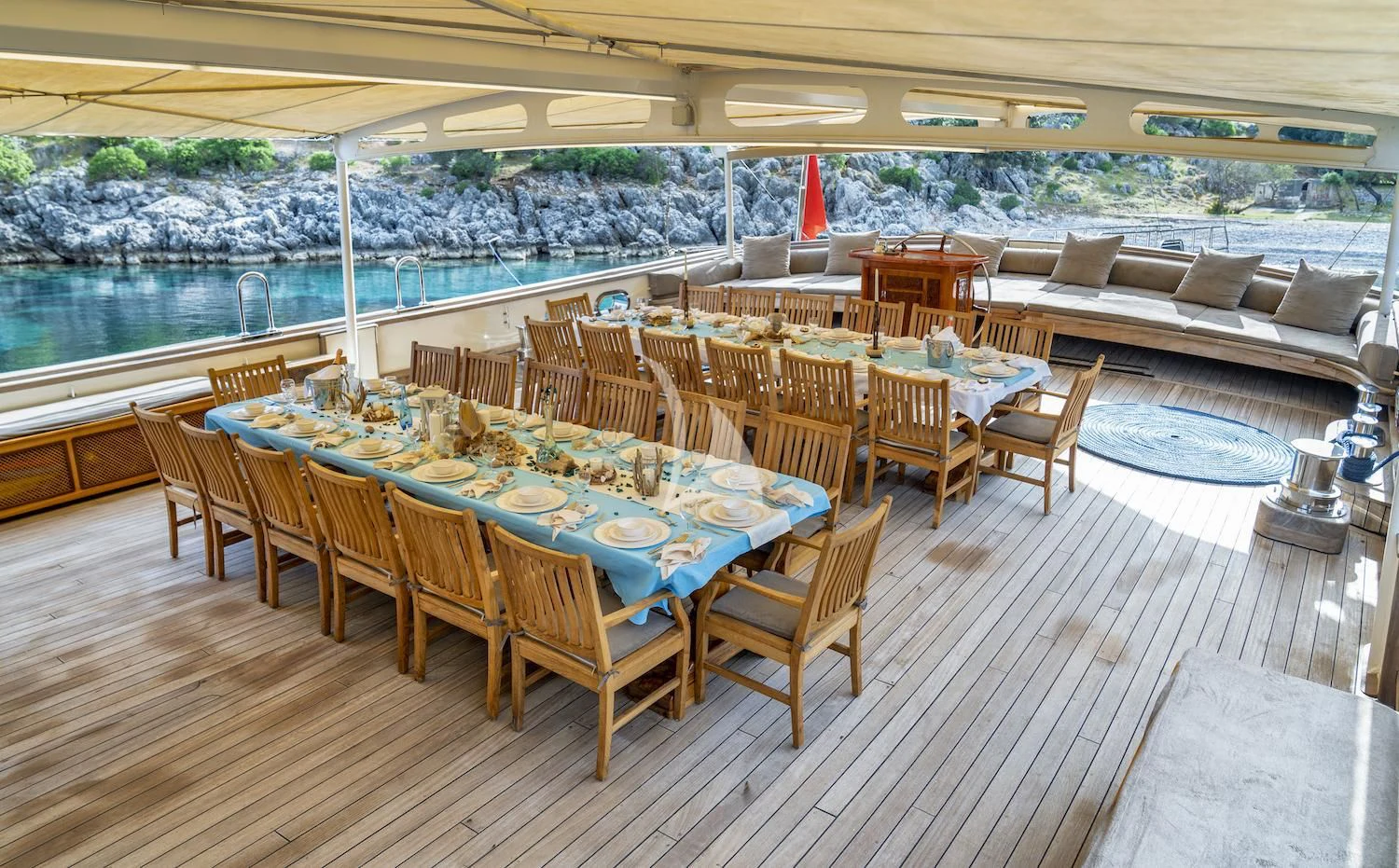 a room with tables and chairs aboard TERSANE 8 Yacht for Sale