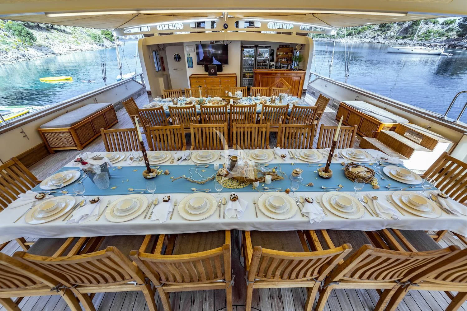 a table set for a dinner party aboard TERSANE 8 Yacht for Sale
