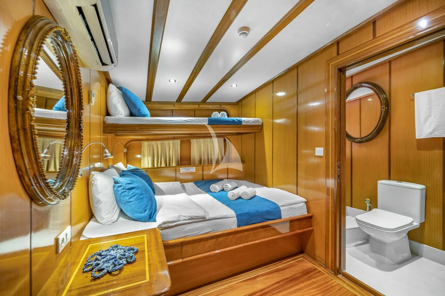 a bathroom with a bed and a mirror aboard TERSANE 8 Yacht for Sale