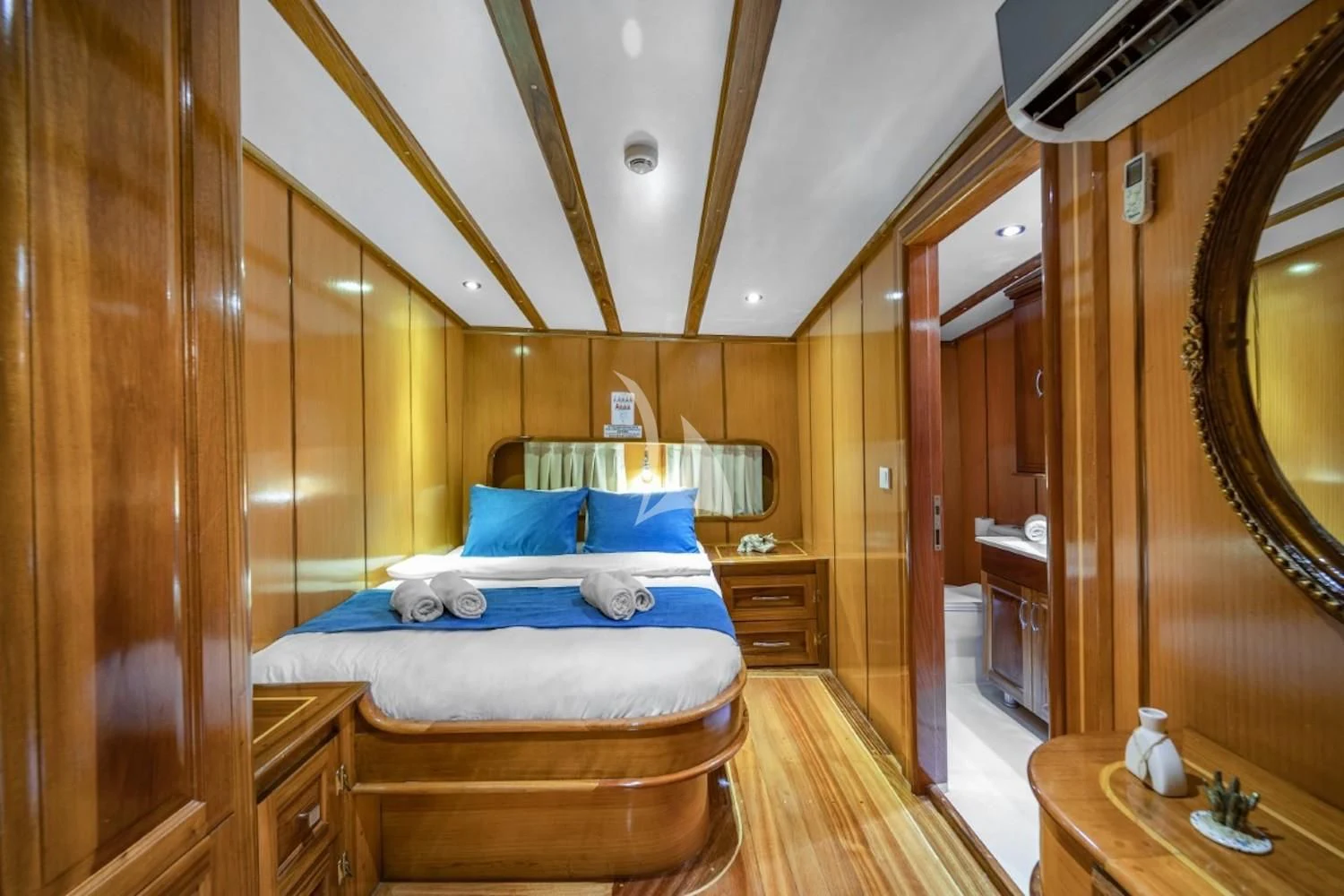 a bed in a room aboard TERSANE 8 Yacht for Sale