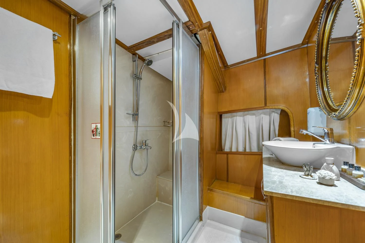 a bathroom with a glass shower aboard TERSANE 8 Yacht for Sale