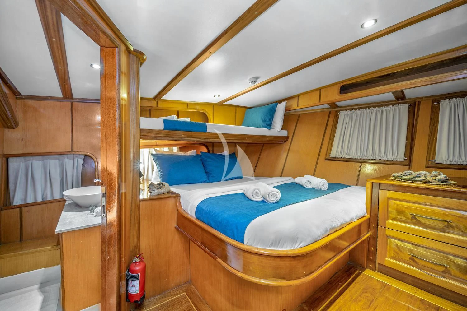 a bed in a wooden room aboard TERSANE 8 Yacht for Sale