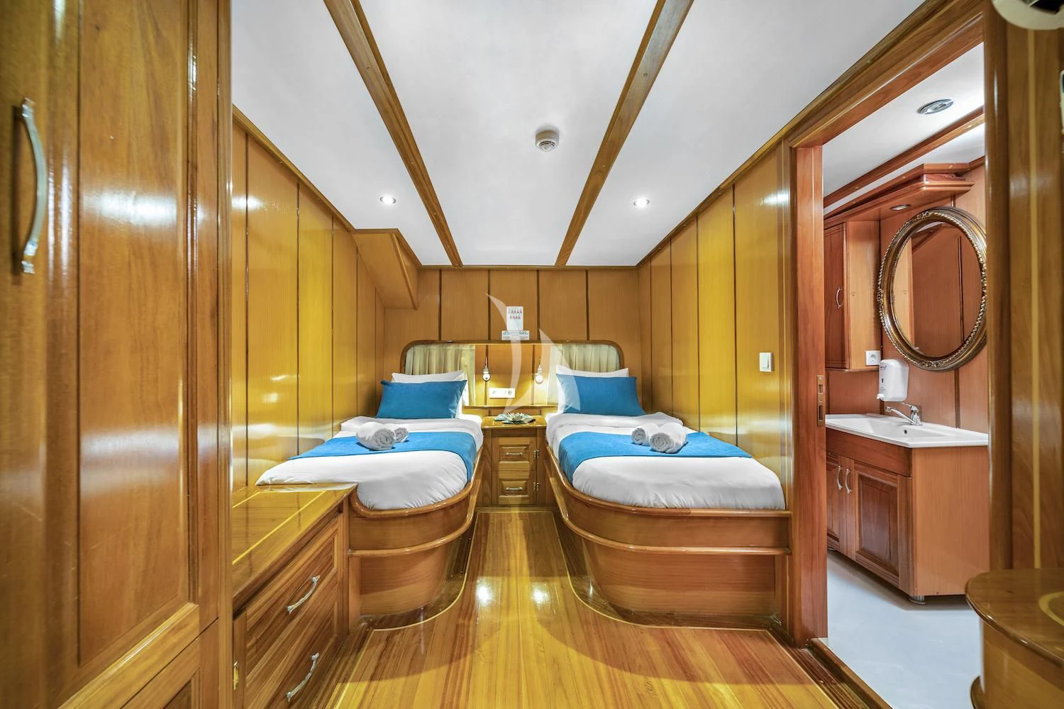 a room with a bed and a mirror aboard TERSANE 8 Yacht for Sale