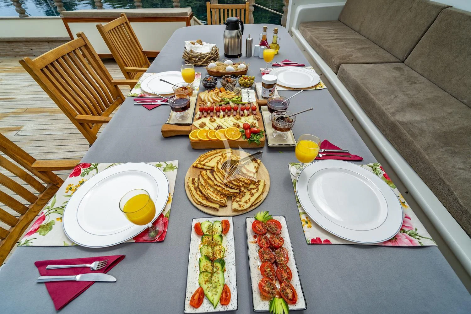 a table with food on it aboard TERSANE 8 Yacht for Sale