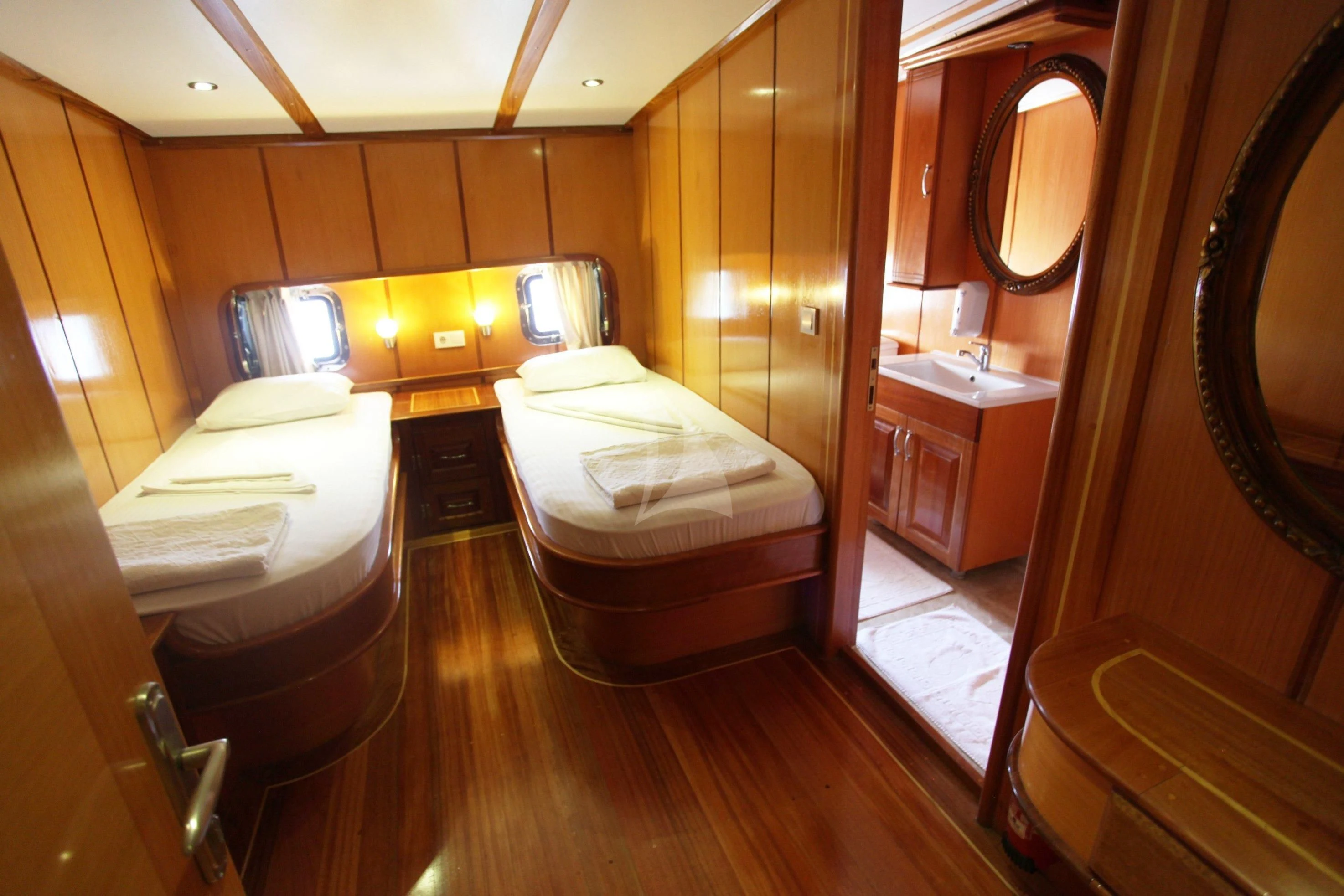 a bathroom with a large mirror aboard TERSANE 8 Yacht for Sale