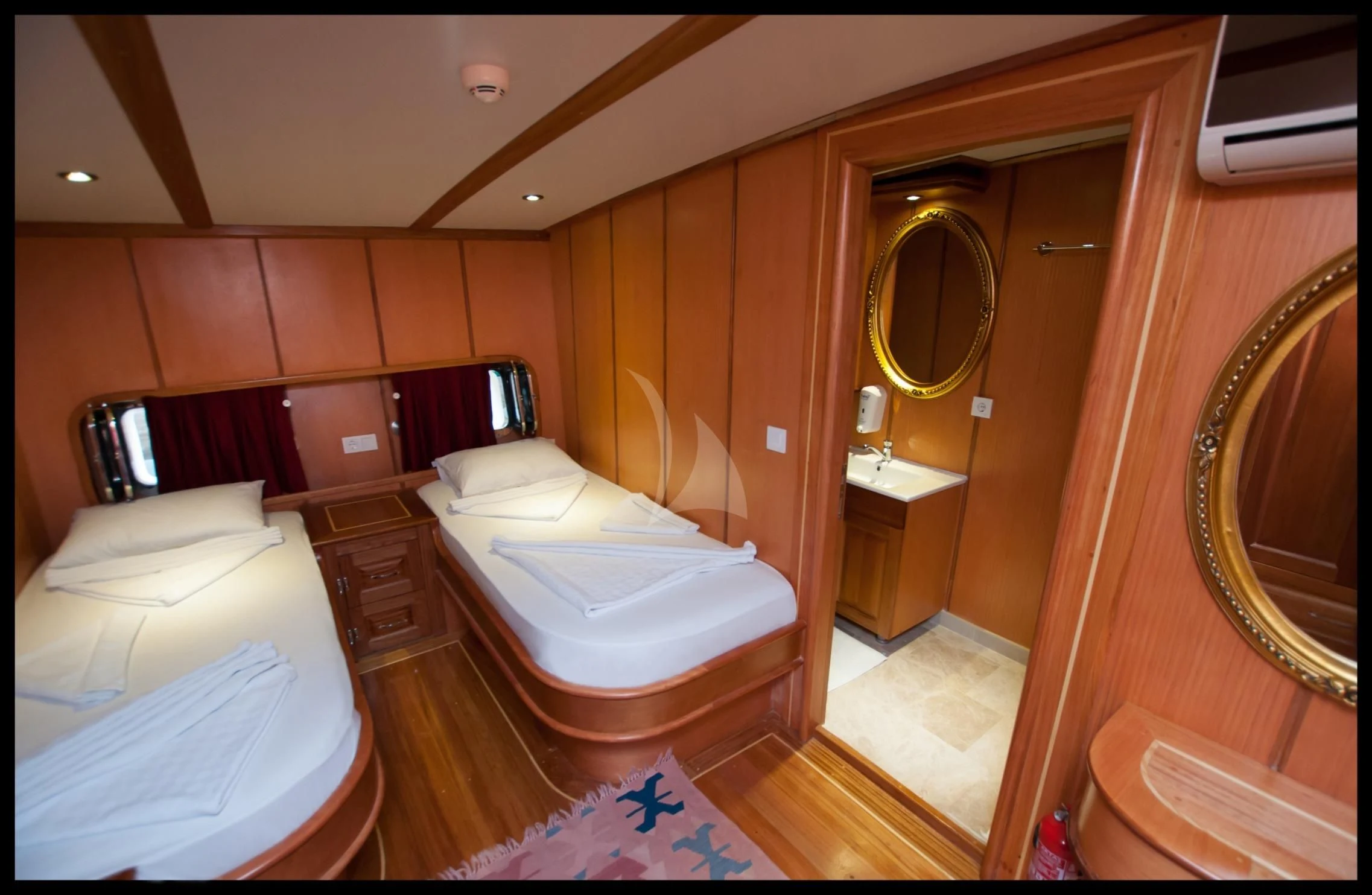 a bathroom with a couple of beds aboard TERSANE 8 Yacht for Sale