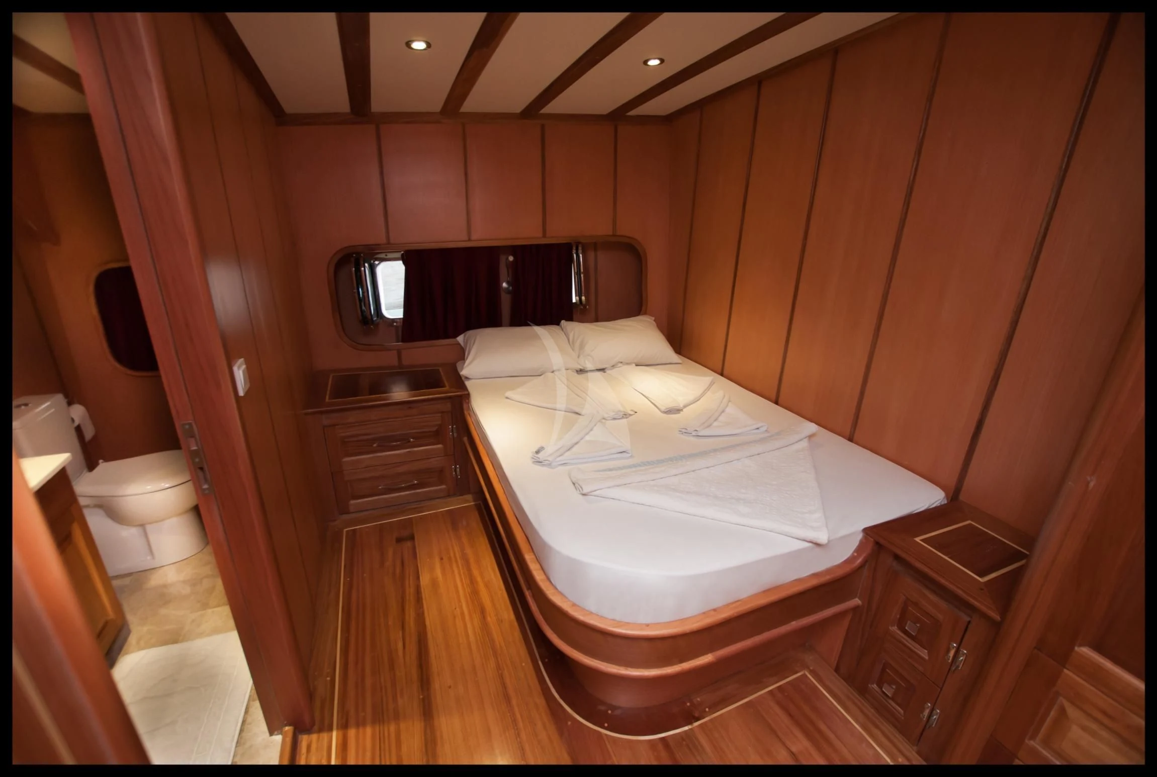 a bed in a room aboard TERSANE 8 Yacht for Sale