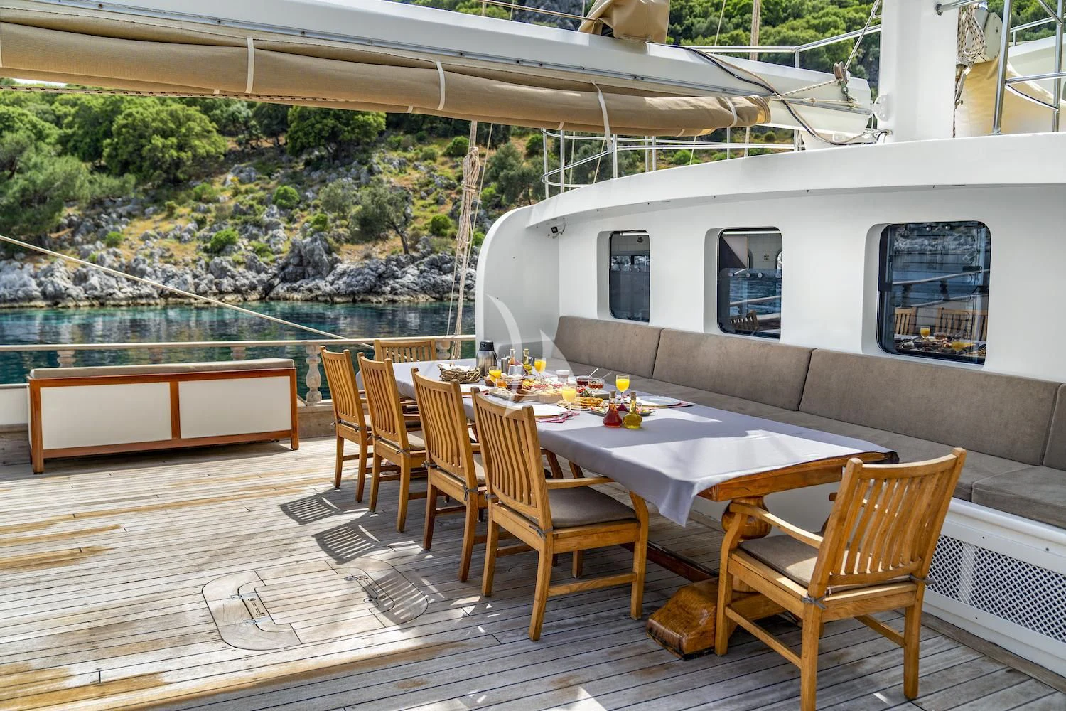 a table and chairs on a deck aboard TERSANE 8 Yacht for Sale