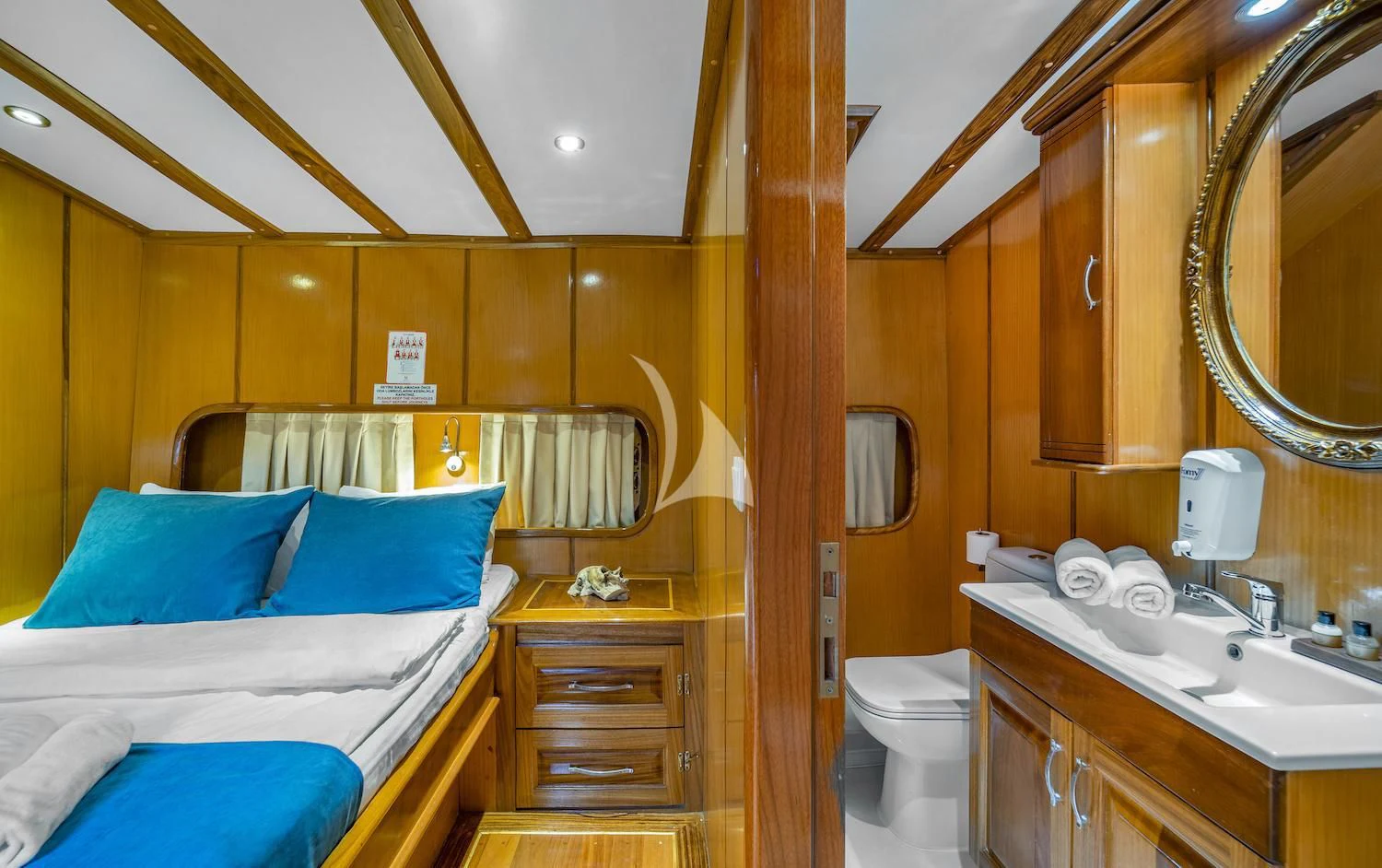 a bathroom with a bed and a mirror aboard TERSANE 8 Yacht for Sale